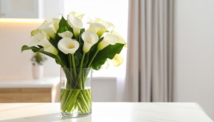 Elegant Calla Lily Bouquet in a Glass Vase on a Table