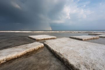solar energy farm in uae is showcased under dramatic storm clouds creating striking contrast