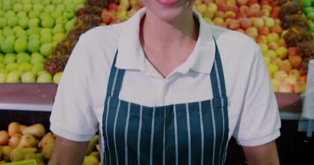 Closeup apple basket initiating camera rising revealing smiling vendor at farmers market - Powered by Adobe