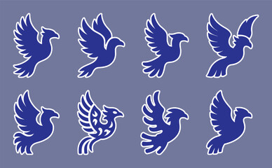 Obraz premium Blue bird silhouettes in flight collection flying wing