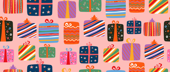 Festive pattern of colorful gift boxes with ribbons on pink background. Element of festive decoration and wrapping paper for Christmas or birthday.