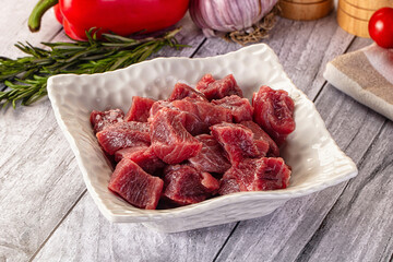 Raw beef meat cubes pieces
