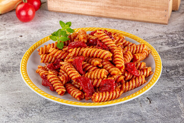 Italian fusilli pasta with tomatoes