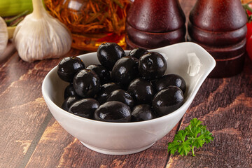 Mediterranean marinated Black olives in the bowl