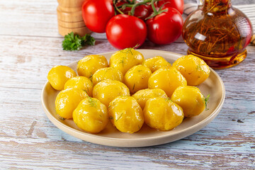 Boiled young potato with oil