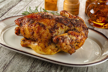 Baked in oven whole chicken with spices