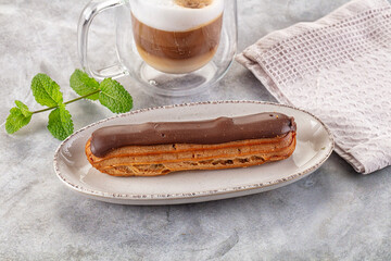 Gourmet chocolate eclair with icing