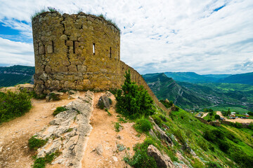 Picturesque mountain landscape with a photofacility tower of the Russian fortress in Gunib. Dagestan, Caucasus