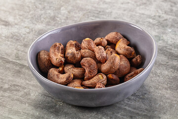 Unpeeled cashew nuts in the bowl