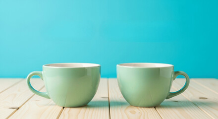 Cozy Dreams text with two green mug on blue background