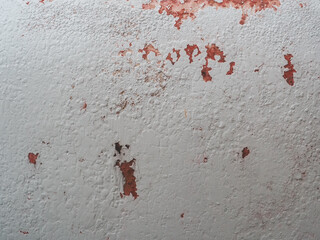 Old house wall with peeling paint for background or renovation work