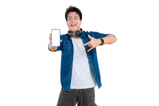 Young man holding smartphone with a blank screen, ready to showcase a new app, a technology concept, or display. He is also smiling at the camera while wearing headphones.on png background