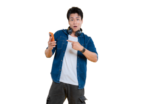 A young man pointing to his phone, seemingly surprised on png background