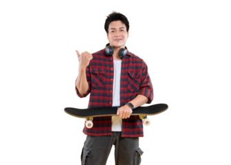 A stylish young man posing with a skateboard and headphones, giving a thumbs-up gesture. The skateboarder is looking at camera with smile on face on png background