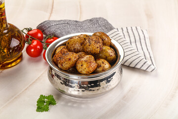 Baked mini potato with herbs