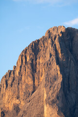 Sassolungo, Langkofel mountain, part of the Dolomites Italian alps, with its distinct orange colour in the morning at sunrise
