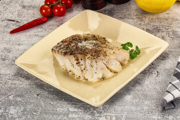 Baked cod fish fillet with spices
