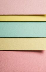 Fototapeta premium Colorful pastel paper stripes creating a vibrant background design
