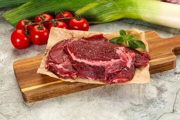 Raw beef cheeks cut for cooking