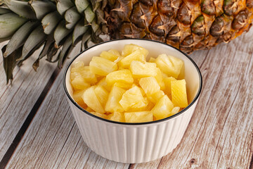 Sweet canned pineapple fruit pieces