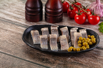 Slided marinated salted herring fillet
