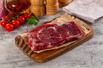 Gourmet raw rib eye steak