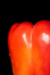 Close up of fresh sweet pepper on a black background