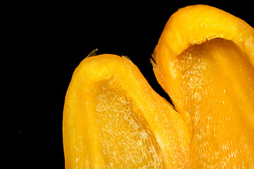 Close up of fresh sweet pepper on a black background