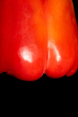 Close up of fresh sweet pepper on a black background