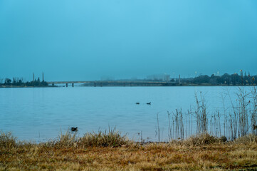 The photo showcases the beautiful scenery on both sides of the Lake Burley Griffin
