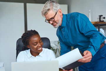 Diverse Colleagues Collaborating On Project In Modern Office, Business Communication And...
