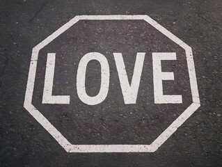 Love Shaped Stop Sign on Asphalt