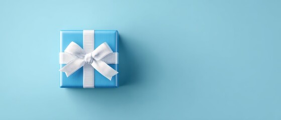 The blue gift box with a white ribbon on a minimalist background.