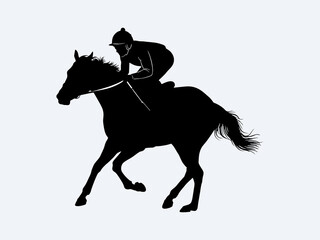 Silhouette of an equestrian athlete in action