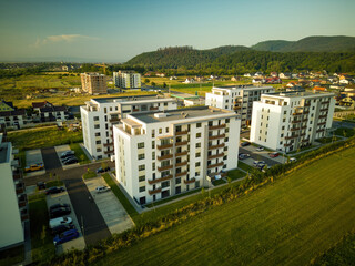 Newly built multifamily houses in Romania — a concept representing the real estate market.