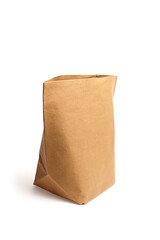 Brown paper bag with crumpled texture, standing upright against a clean white background,...