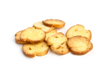 Crispy golden-brown baked cookies arranged on a white background, showcasing their crunchy texture and inviting appearance, perfect for dessert or snack ideas