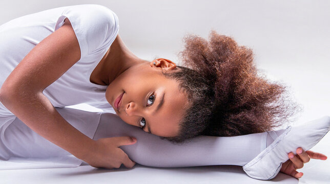 Ballerina in dance class. Girl white tutu, leotard learning to dance. Kids practice full split. Flexible little african american girl ballerina. African girl ballet studio