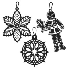 Fototapeta premium Black ornaments featuring a poinsettia snowflake gingerbread man and ornate bauble