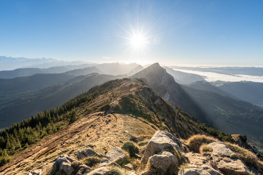 View from the summit of Mittagg&uuml;pfi mountain to the Napf region and the Bernese Alps in the evening with low sun, Lucerne, Switzerland.