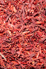 Fototapeta premium Red chilli pepper spices for sale on a spice market in Mumbai, India, fresh ingredients for cooking indian food