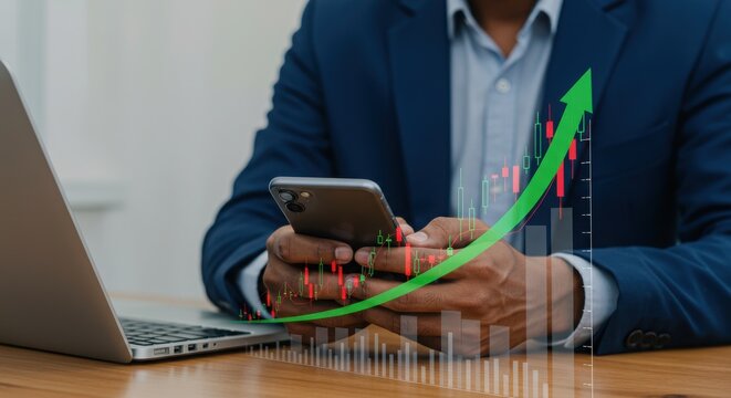 Businessman analyzing financial data on smartphone. Growth graph overlay with green upward arrow. Modern financial strategy and success.