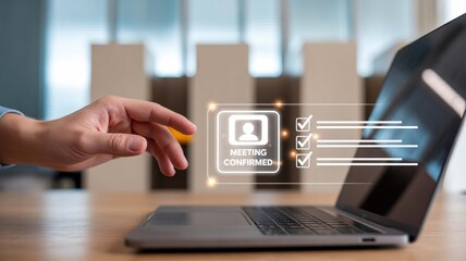 Confirming a virtual meeting with ease a hand hovers over a laptop to schedule work and connect with colleagues in a