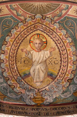 PIACENZA, ITALY - MAY 19, 2025: The fresco of Jesus Child  in Cathedral - Cattedrale di Santa Maria Assunta e Santa Giustina by Eugenio Cisterna (1901).