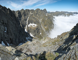 Mountain landscape, beautiful weather, above the clouds.
