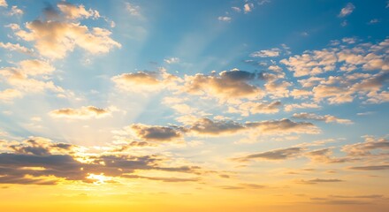 Fototapeta premium Beautiful view of blue sky with clouds at sunrise. Partly cloudy.Background cloud summer. Cloud summer. Sky cloud clear with sunset. Natural sky cinematic beautiful yellow and white texture background