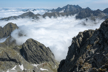 Standing on the highest peak and having everything under your feet.
