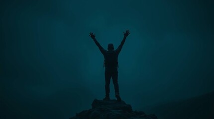 Embracing the Summit: A silhouette of a solitary figure celebrates triumph atop a mountain peak, hands raised towards the heavens, with a feeling of empowerment.