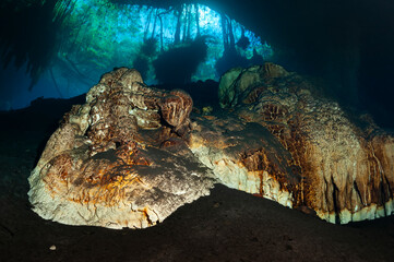 cave entrance and stalagmite