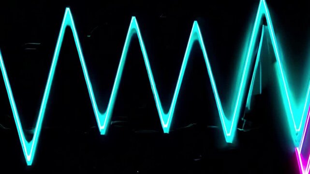 Abstract neon light design in the form of zig-zag waves against a dark background, highlighting the vibrant and modern nature of the artwork